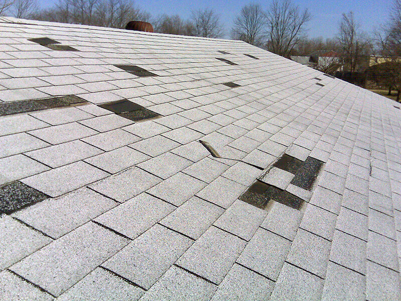 Wind damage roof repair in Tyler Texas